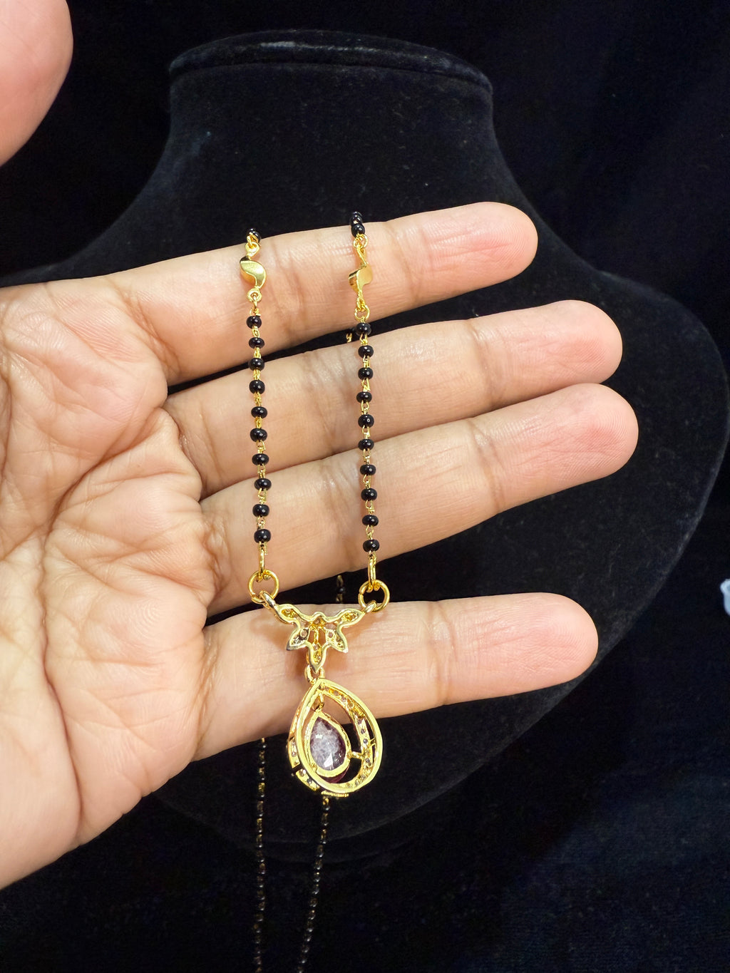 Black beads chain with pink stone pendant!