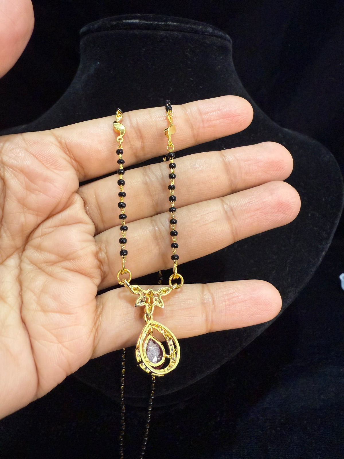 Black beads chain with pink stone pendant!