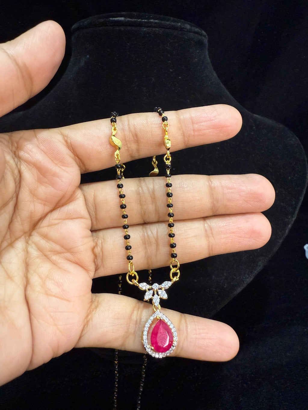 Black beads chain with pink stone pendant!